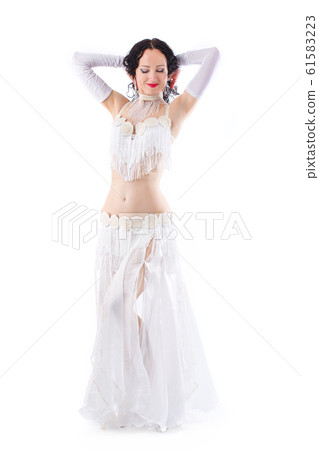 The sexy girl is froze in a dance position 61583223