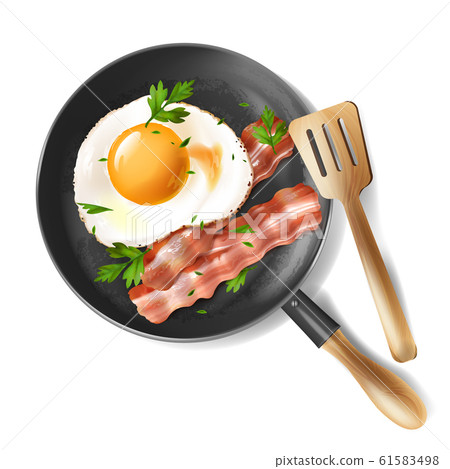 fried eggs with bacon strips and parsley 61583498