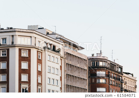 Luxurious apartment buildings in the Jeronimos district of Madrid. Luxurious apartment buildings in the Jeronimos district of Madrid. 61584071