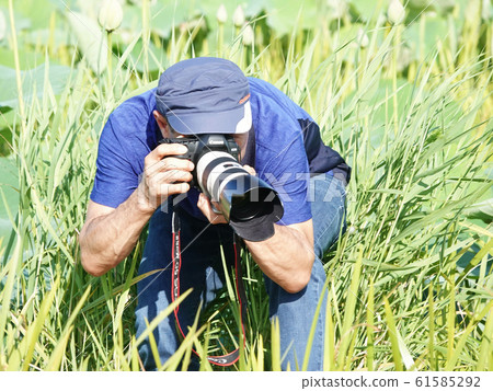 Photographer 61585292