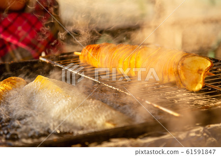 Spiral sliced baked potatoes. 61591847