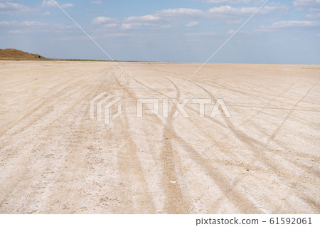 Dry sea endless sand beautiful clouds beautiful Dry sea endless sand beautiful clouds beautiful 61592061