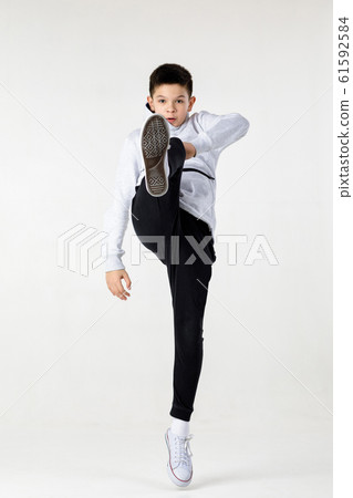 Little hip-hop boy dancing Little hip-hop boy dancing 61592584