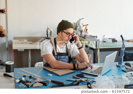 Leatherworker calling client Leatherworker calling client 61597572