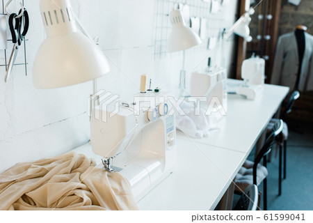 Sewing machines in row Sewing machines in row 61599041