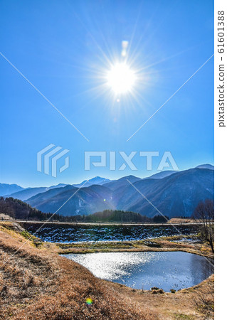 Mountains and sun Mountains and sun 61601388