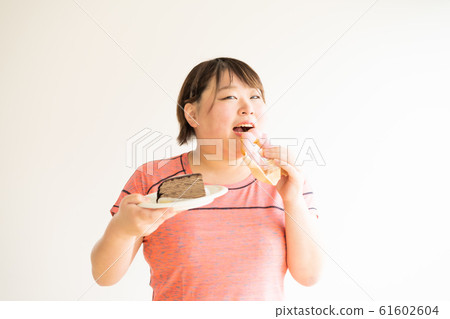 Woman taking sugar Woman taking sugar 61602604
