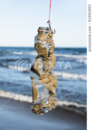 used plastic bottle in a fish hook used plastic bottle in a fish hook 61602803