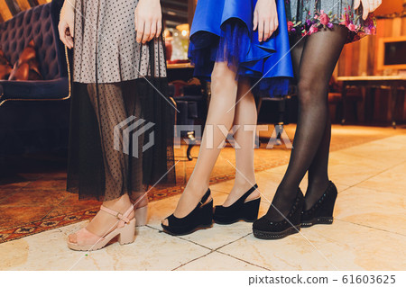 Close up of elegant female legs on background. Close up of elegant female legs on background. 61603625
