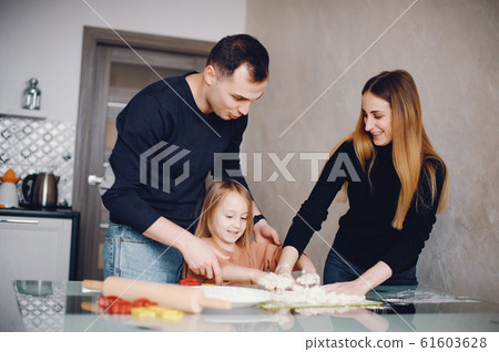 Family cook the dough for cookies Family cook the dough for cookies 61603628