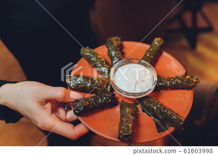 dolma. Dolmades Stuffed Grape Leaves. copy space. space for text. dolma. Dolmades Stuffed Grape Leaves. copy space. space for text. 61603998