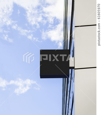 Blank black square sign on glas wall mockup, sky background Blank black square sign on glas wall mockup, sky background 61605970