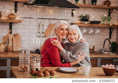 Two mature grey-haired positive ladies feeling great together 61606052