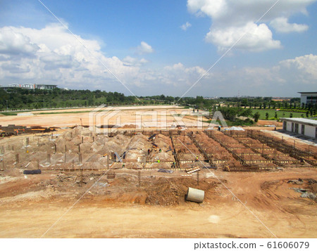 Building ground beam reinforcement bar and form work fabricated at site by construction workers. Concrete will be four into it after satisfied by engineer. Building ground beam reinforcement bar and form work fabricated at site by construction workers. Concrete will be four into it after satisfied by engineer. 61606079