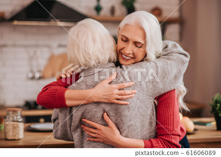 Two mature grey-haired positive ladies feeling wonderful 61606089