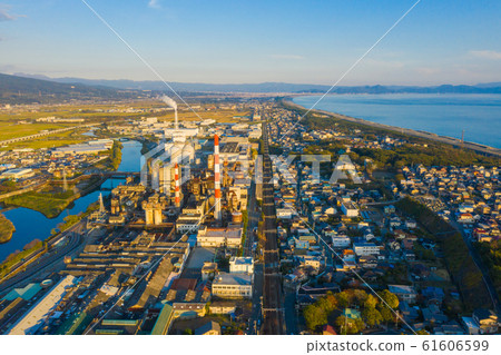 Aerial view of petrochemical oil refinery and sea 61606599