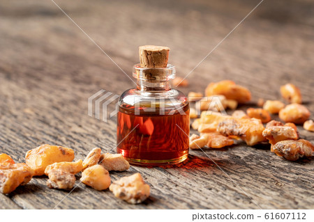 A bottle of styrax benzoin essential oil and resin 61607112