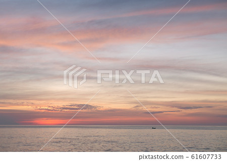 Sea pink sunset. Beautiful color clouds. 61607733