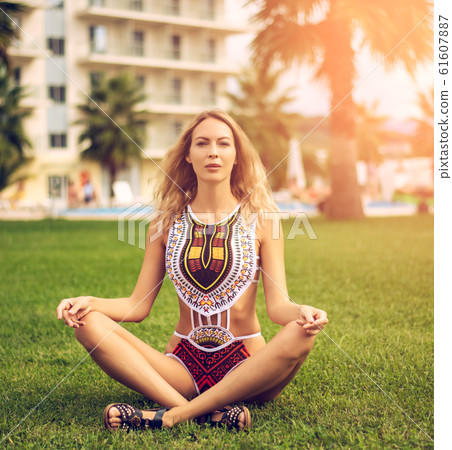 Young beautiful girl wearing fashion swimsuit 61607887