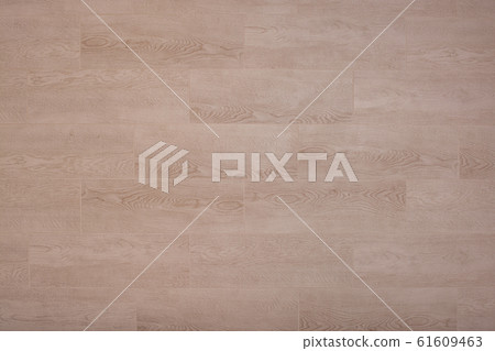 Ceramic tiles on the wall under the tree. The background Ceramic tiles on the wall under the tree. The background 61609463