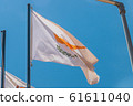 The national flag of Cyprus. Light flag on the flagpole. The summer wind flutters the flag. 61611040