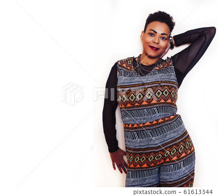 young pretty african american woman happy smiling posing against white background, lifestyle people concept 61613344