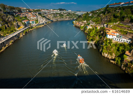 View of the Douro River in a beautiful early spring day View of the Douro River in a beautiful early spring day 61614689