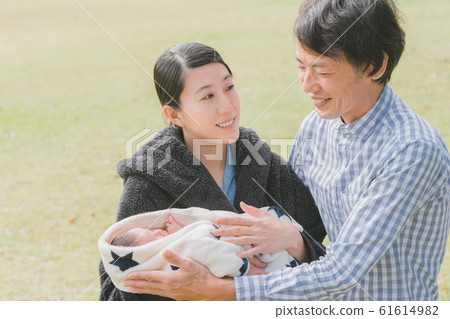 Day 10 Newborn baby family walk park 10 days after birth 61614982