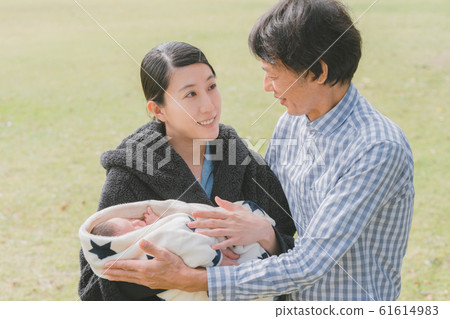 Day 10 Newborn baby family walk park 10 days after birth 61614983