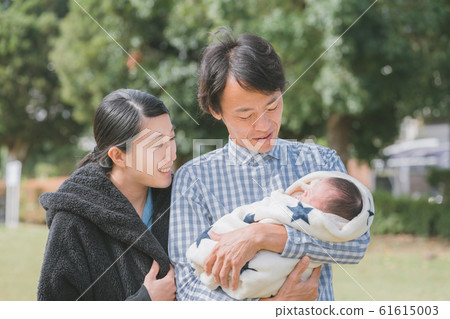Day 10 Newborn baby family walk park 10 days after birth 61615003