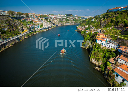 View of the Douro River in a beautiful early spring day View of the Douro River in a beautiful early spring day 61615411
