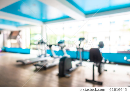 Abstract blur gym room interior with fitness equipment Abstract blur gym room interior with fitness equipment 61616643