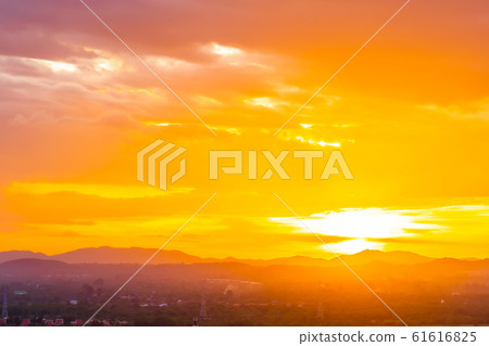 Beautiful landscape with sunrise or sunset over mountain 61616825