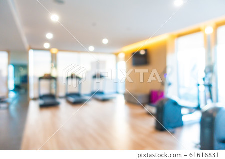 Abstract blur gym room interior with fitness equipment Abstract blur gym room interior with fitness equipment 61616831