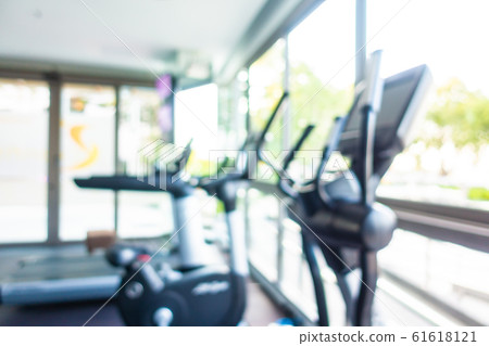 Abstract blur gym room interior with fitness equipment Abstract blur gym room interior with fitness equipment 61618121