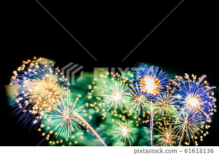 Beautiful colorful firework display at night for celebrate Beautiful colorful firework display at night for celebrate 61618136