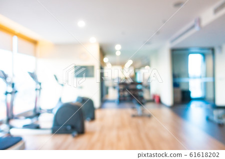 Abstract blur gym room interior with fitness equipment Abstract blur gym room interior with fitness equipment 61618202