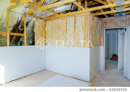 Installing plasterboard sheet to wall for attic Installing plasterboard sheet to wall for attic 61619310