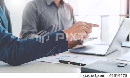 Business entrepreneur colleagues discussing 61619376