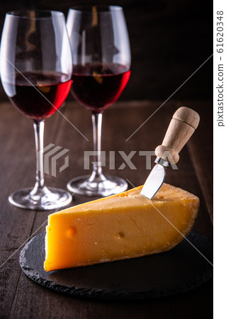Cheese and red wine 61620348