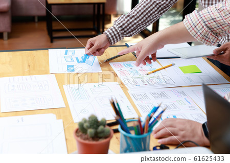 Graphic designers work together with UX UI Graphic designers work together with UX UI 61625433