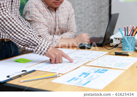 Graphic designers work together with UX UI Graphic designers work together with UX UI 61625434