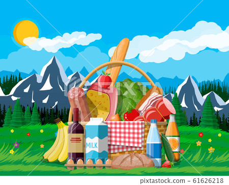 WIcker picnic basket full of products. WIcker picnic basket full of products. 61626218