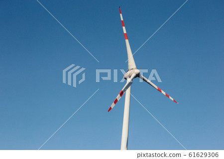 Wind turbines against blue sky Wind turbines against blue sky 61629306