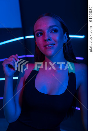 Studio portrait of a beautiful attractive athletic slim gir. Studio portrait of a beautiful attractive athletic slim gir. 61630894