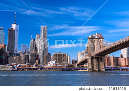 "New York" View of Brooklyn Bridge Park, a skyscraper in Manhattan 61631016