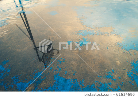 Rainy season / rain image: Basket goal reflected 61634696