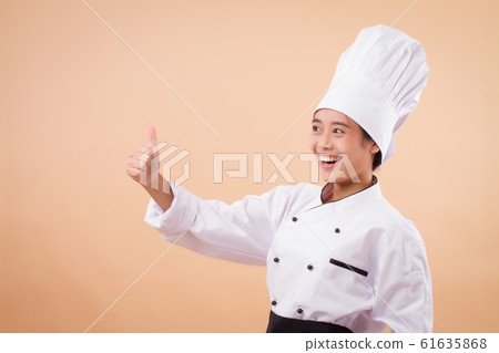 woman chef giving thumb up 61635868