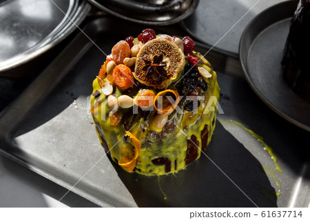 Cupcake with nuts and fruits. The cuisine of Tel 61637714