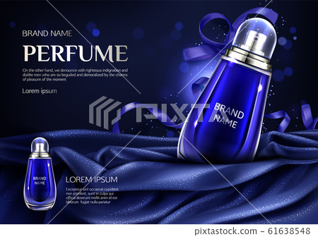Perfume glass bottle on blue silk folded fabric 61638548